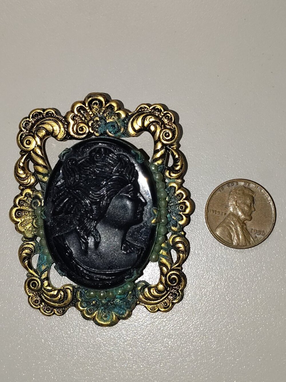 Vintage Victorian Revival Black Glass Cameo Brooch • Gold‑Tone Frame • Faux Pear